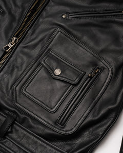 Close-up of Scrambler leather jacket pocket with antique brass zipper